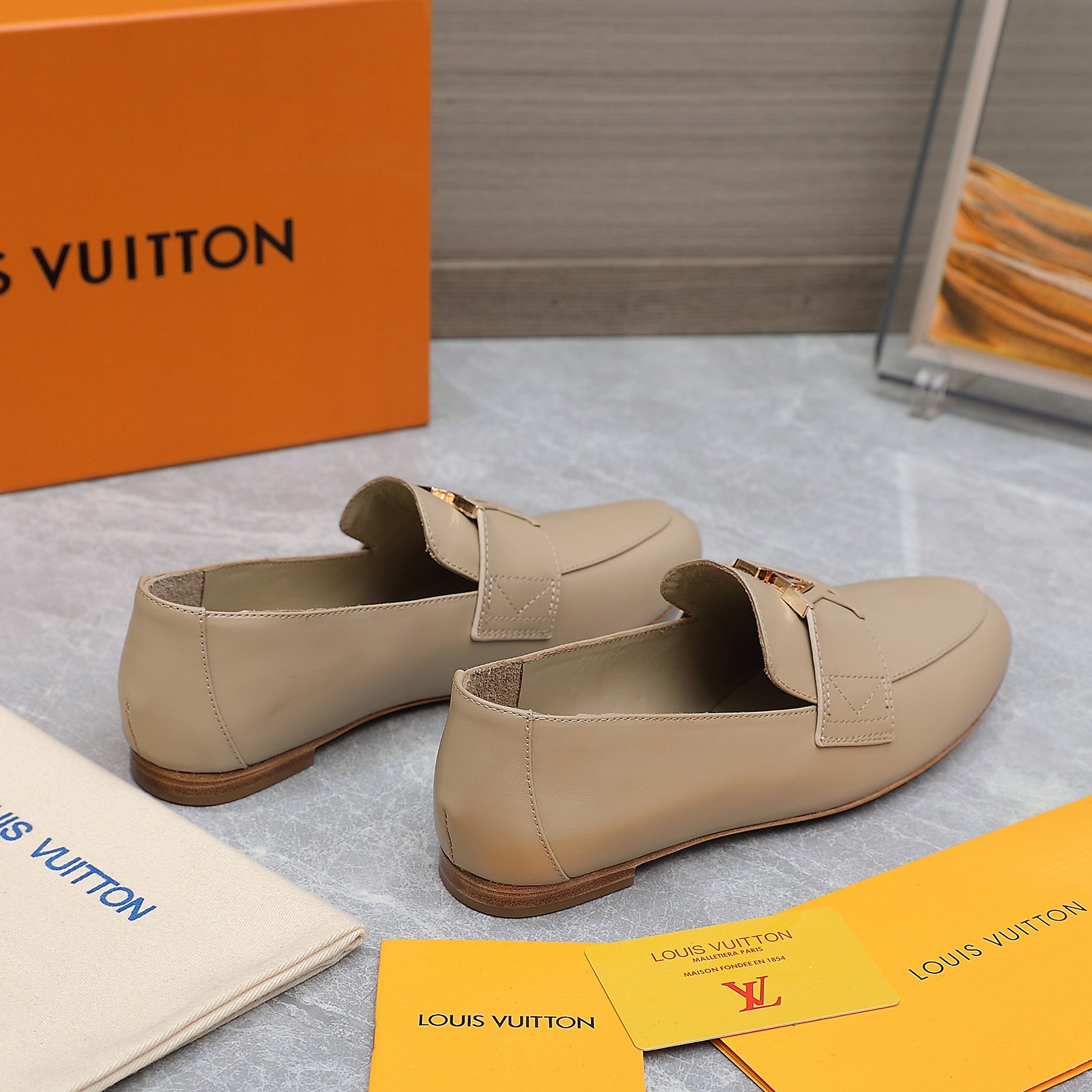 Louis Vuitton Women's Loafers in Beige Leather with Gold-Tone Hardware 5 a1705306215441 4724