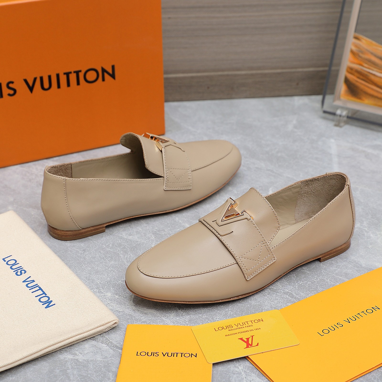 Louis Vuitton Women's Loafers in Beige Leather with Gold-Tone Hardware 3 a1705306215456 4673