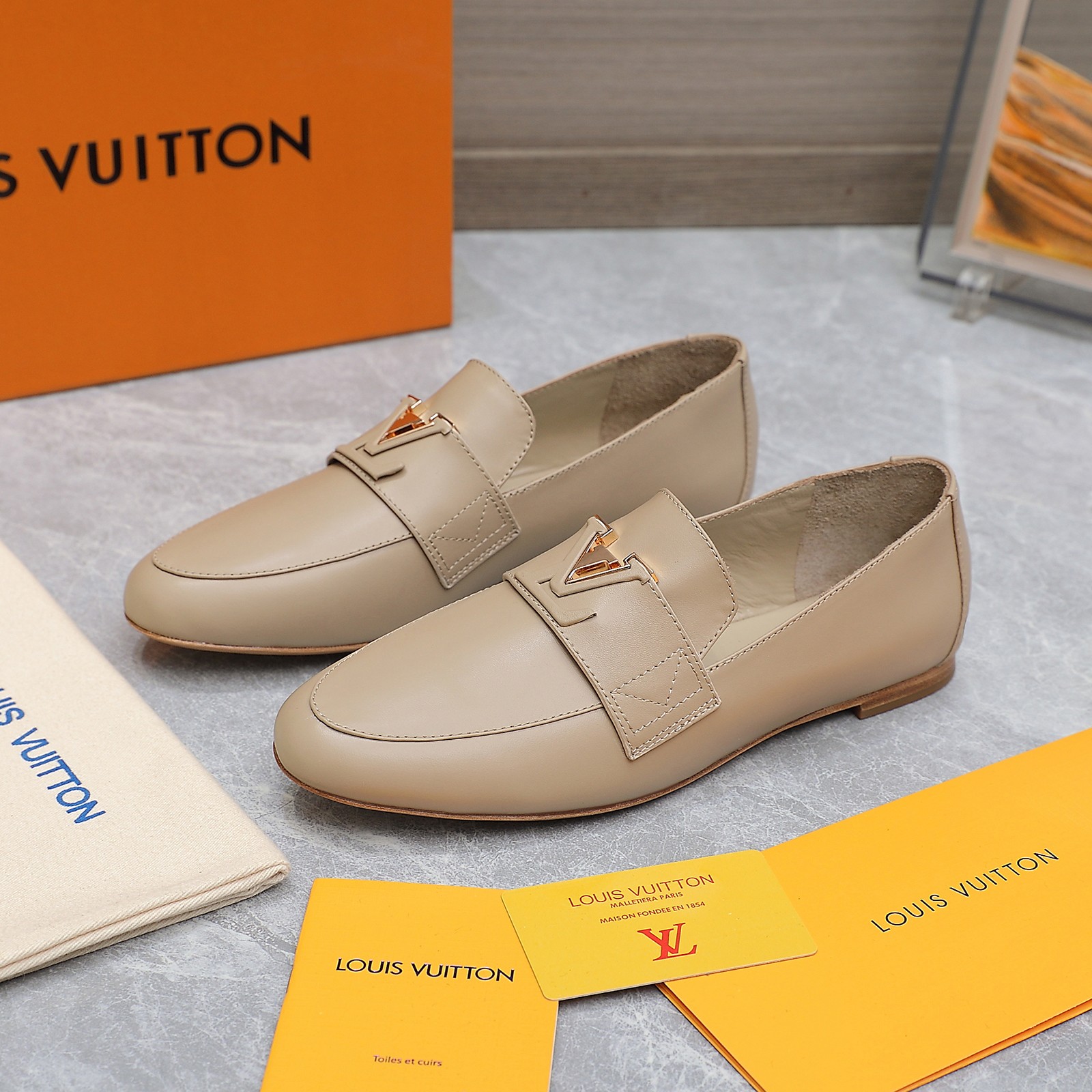 Louis Vuitton Women's Loafers in Beige Leather with Gold-Tone Hardware 6 a1705306215478 1637