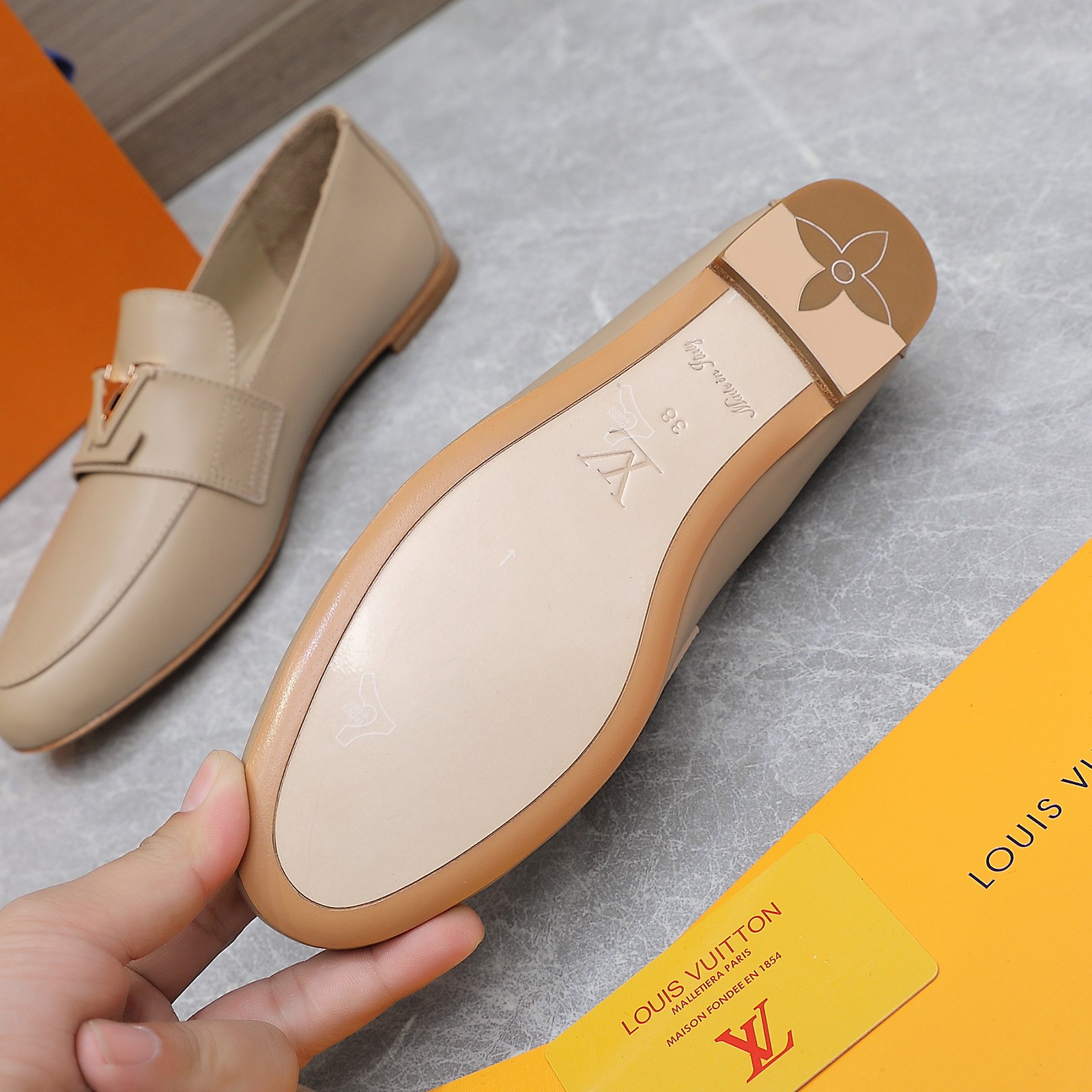 Louis Vuitton Women's Loafers in Beige Leather with Gold-Tone Hardware 9 a1705306216982 4378