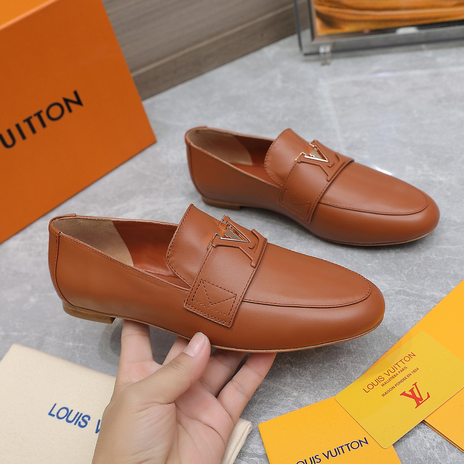 Louis Vuitton Women's Loafers in Brown Leather with Signature Buckle 2 a1705306247178 3687