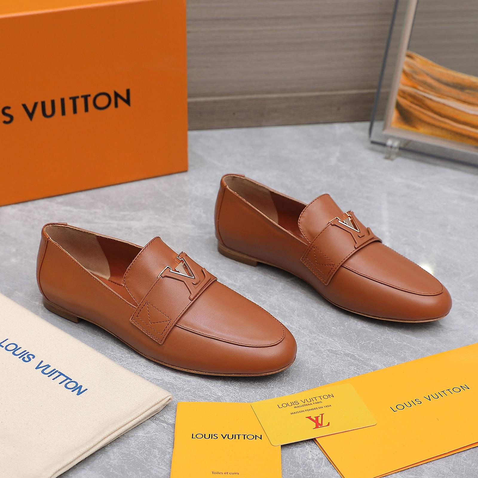 Louis Vuitton Women's Loafers in Brown Leather with Signature Buckle 4 a1705306247185 7128