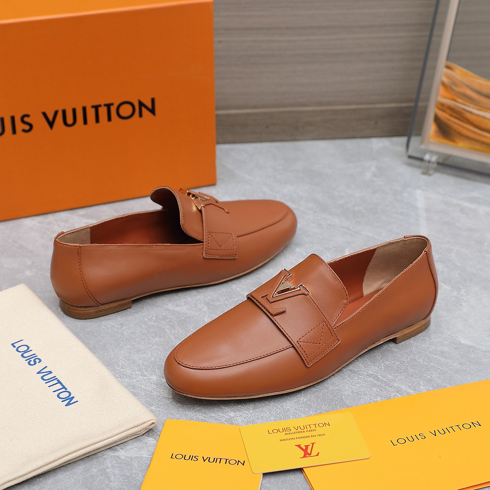 Louis Vuitton Women's Loafers in Brown Leather with Signature Buckle 6 a1705306247223 1605