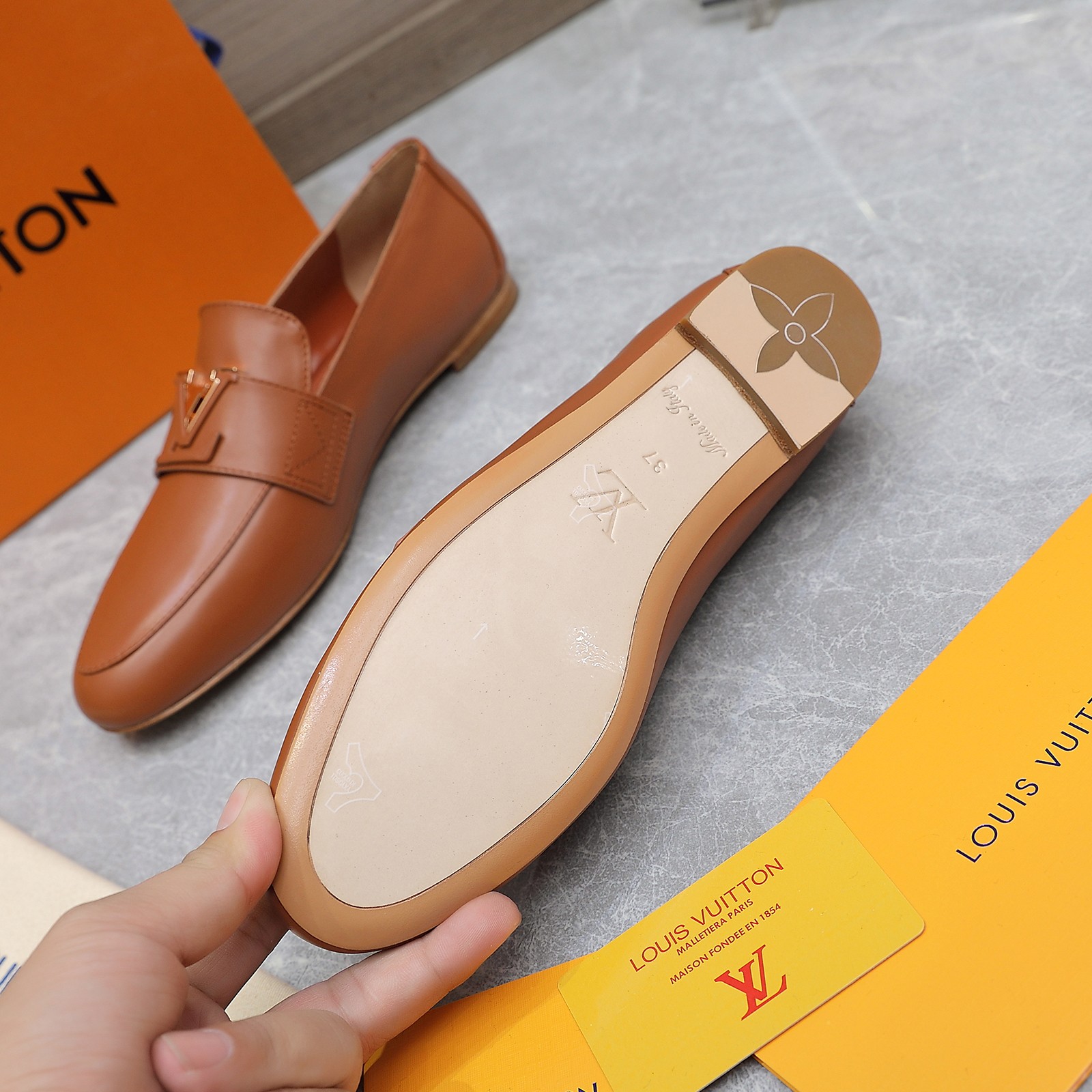 Louis Vuitton Women's Loafers in Brown Leather with Signature Buckle 10 a1705306248223 4517