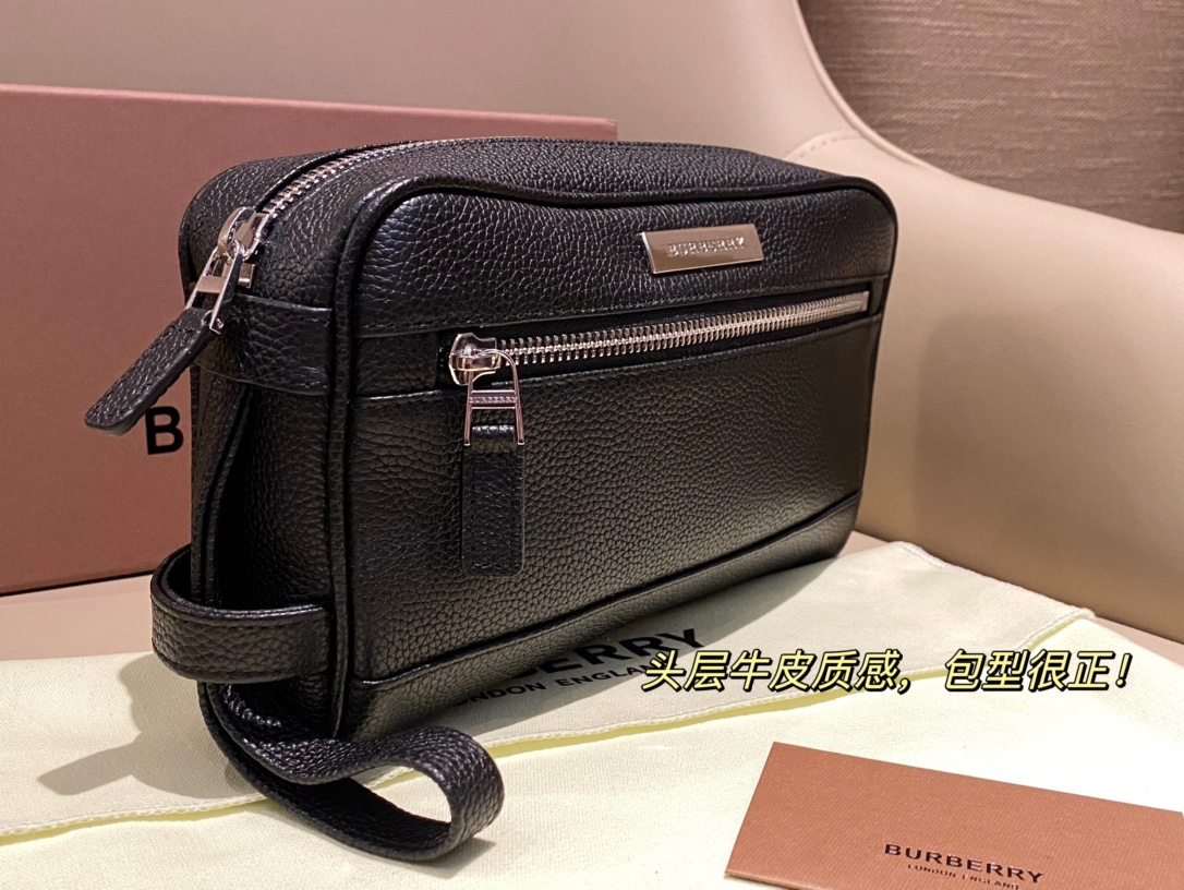 Burberry Men's Leather Clutch featuring a structured silhouette - Comprehensive