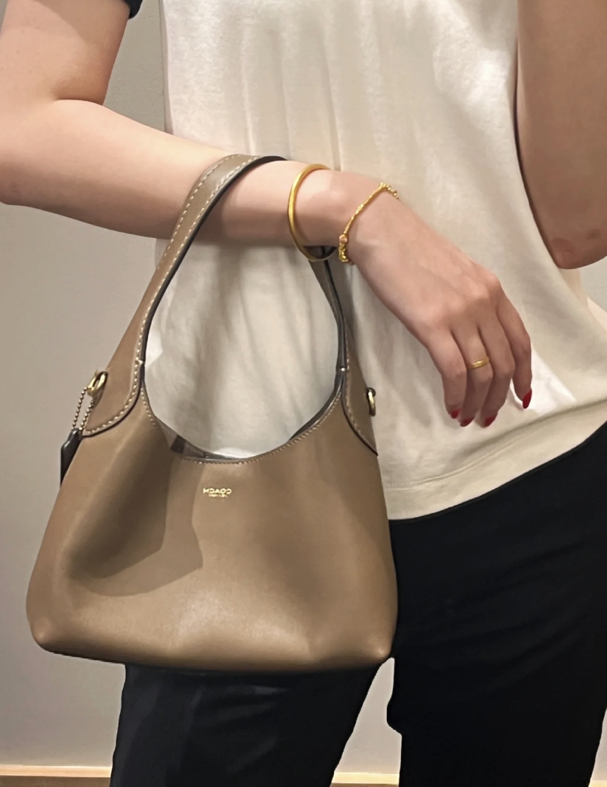 Crafted from smooth calfskin leather, this design features a minimalist  - Comprehensive 2