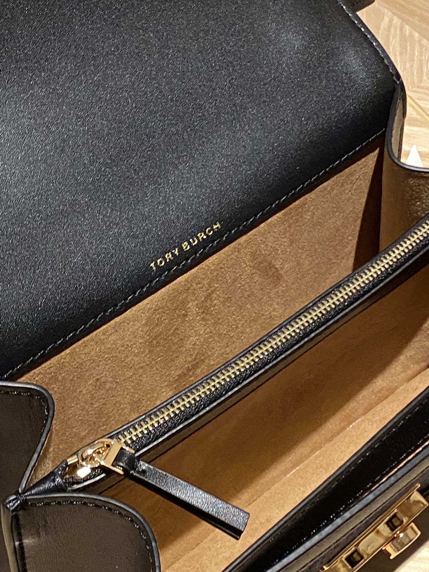 The bag features a full leather interior crafted from two distinct - Comprehensive 4