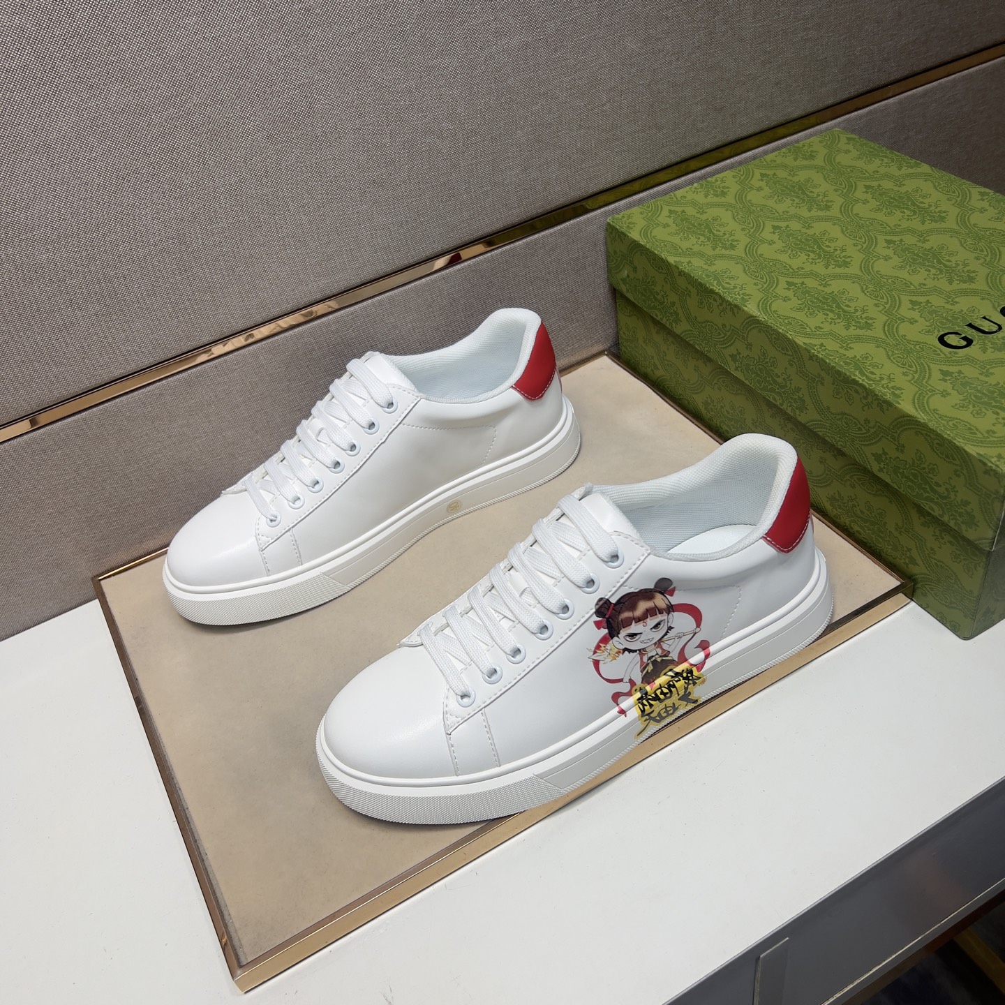 Gucci Men's White Leather Ace Sneaker with Cartoon Character and Red Heel 3 i1744043880080 5325 0 1