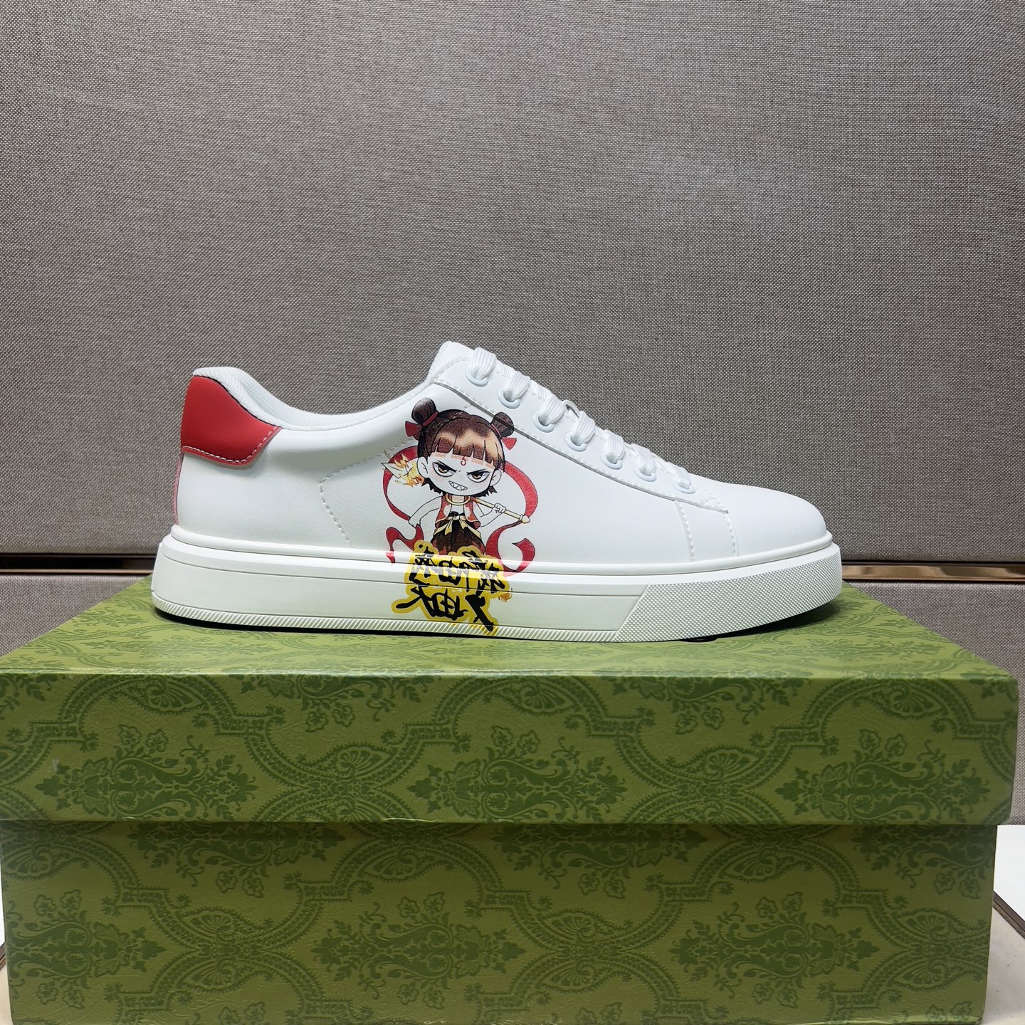 Gucci Men's White Leather Ace Sneaker with Cartoon Character and Red Heel 4 i1744043881342 8885 0 2