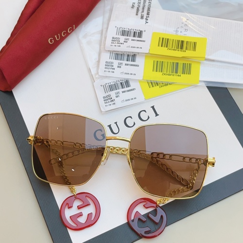 Gucci 0724S Gold-Grey Sunglasses with Chain and Interlocking G Charms 1 Gucci 0724S Gold-Grey Sunglasses with Chain and Interlocking G Charms
