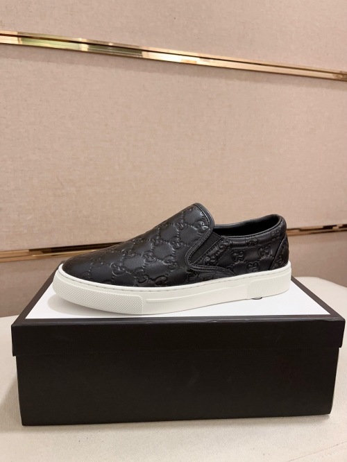 Gucci Men's Black Leather Slip-On Sneakers with Embossed GG Motif 1 Gucci Men's Black Leather Slip-On Sneakers with Embossed GG Motif