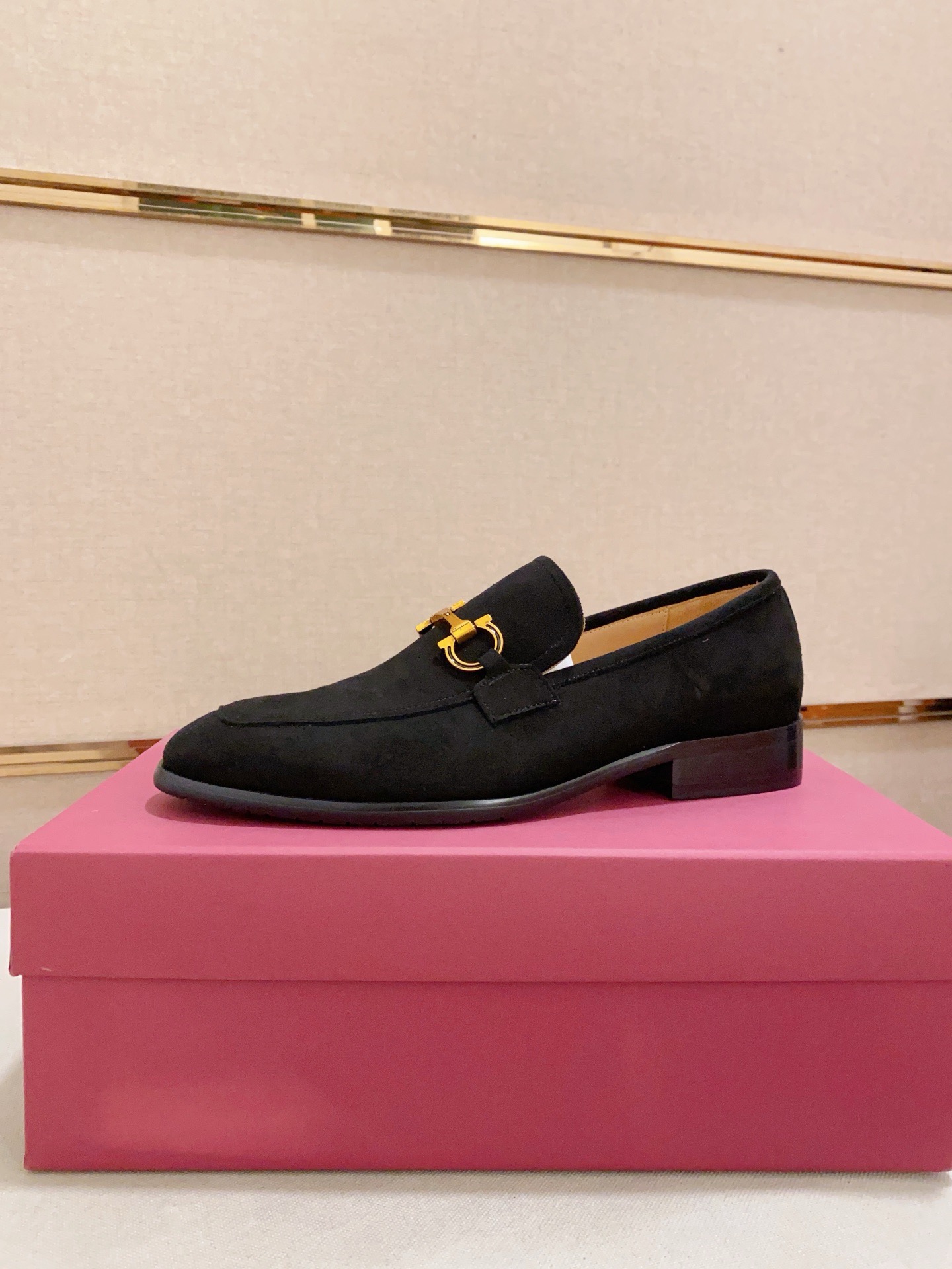 Ferragamo Men's Black Leather Loafers with Gold Buckle Accent