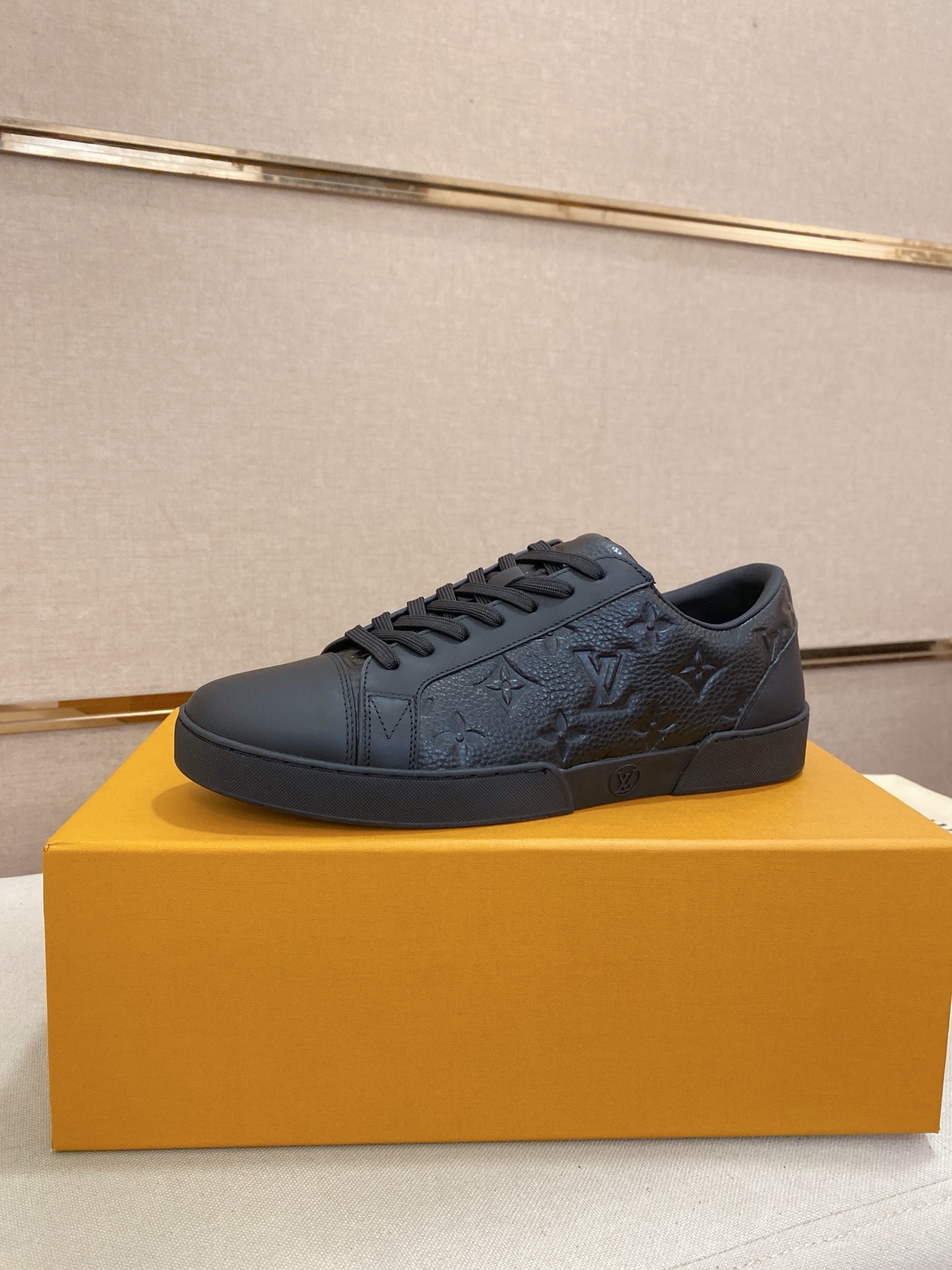 Louis Vuitton Men's Leather Monogram Embossed Low-Top Sneakers 1 Louis Vuitton Men's Leather Monogram Embossed Low-Top Sneakers