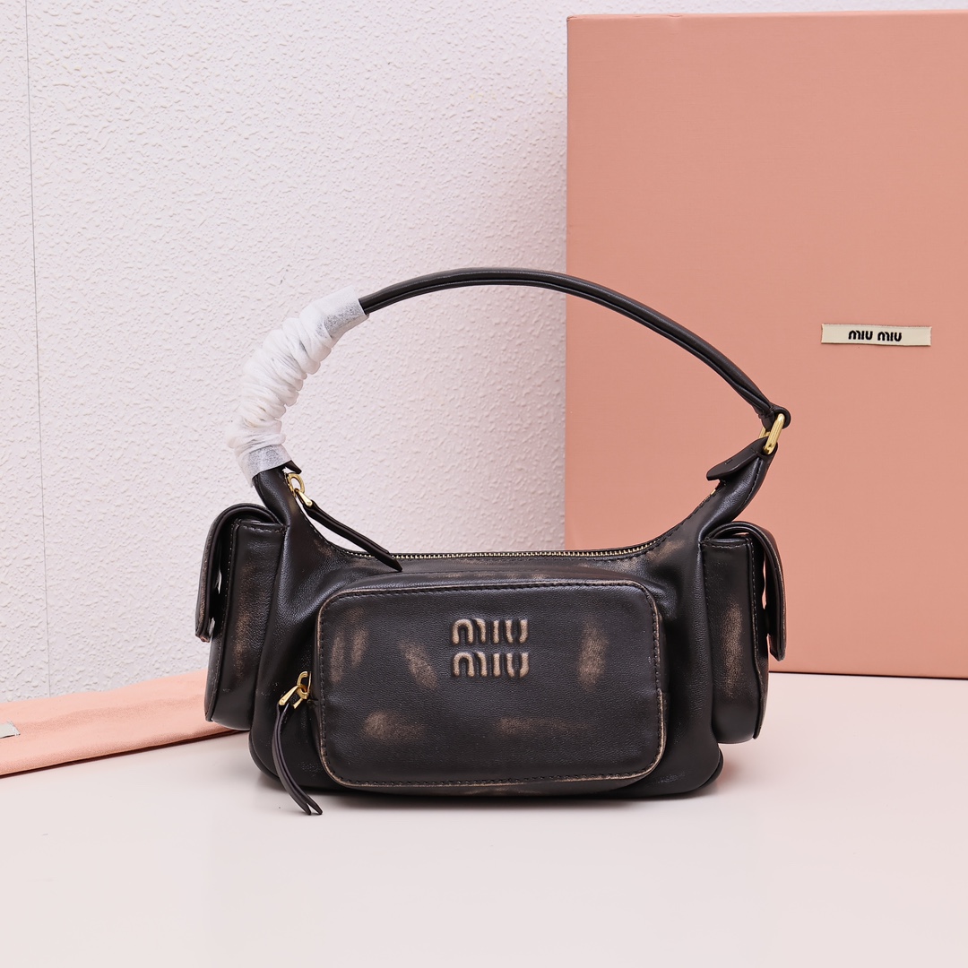 Miumiu motorcycle bag, vintage style in vogue, with multiple practical pockets. Can be worn under the arm, on the shoulder, or carried by hand. Embossed logo with brand name, exuding a trendy motorcycle vibe. Sweet and spicy, available in various colors, youthful and energetic. Effortlessly stylish, suitable for daily outings or commuting to work. Material: imported lambskin. Size: 21cm. Comes in original factory packaging. Color: vintage. image 1