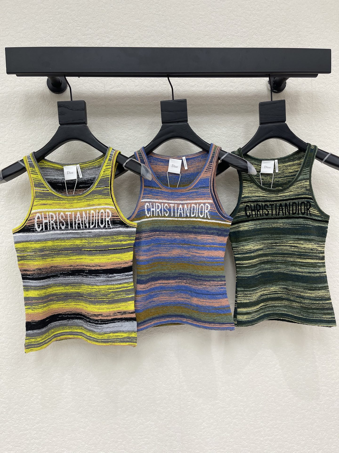 NO:865051,Dio*26 new spring and summer gradient striped knitted vest, soft knitted fabric, super comfortable to wear!  Sleeveless design + logo on the chest, full of brand feel. It can be worn alone or layered inside in spring and summer. It can be easily paired with jeans and skirts. It can be worn for daily leisure and vacation with a sense of fashion~SML,, dior, skirts, jeans,19860909Dio*26春夏新款渐变色条纹针织背心,柔软针织面料,穿着超舒适！无袖设计+胸前logo字样,品牌感满满春夏单穿或内搭都OK,轻松搭配牛仔裤、半裙,日常休闲、度假都能穿出时髦感～SML,,dior,skirts,jeans,,Women's clothing