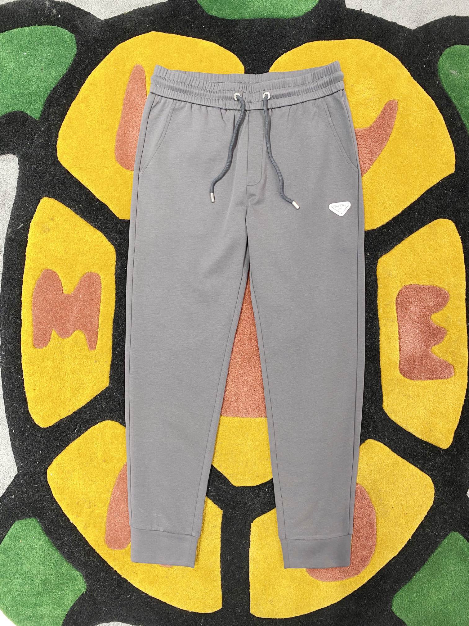 NO:117028,PRD 2025ss Spring and Summer New casual pants Triangle logo   rear pocket embroidery craftsmanship Perfect hardware   top-grade fabric customization Comfortable upper body Size M-XXXL,,alexander wang19860909PRD 2025ss春夏新款休闲裤 三角标标识 后口袋刺绣工艺 完美五金 顶级面料定制 上身舒适 码数M-XXXL,,alexander wang,Men's clothing