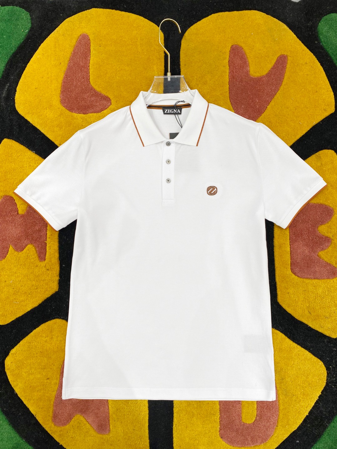 NO:125981,ZGN 2025ss Spring and Summer New Mercerized Beaded Lapel Polo Heavy Industry Embroidery Logo on the chest Comfortable and Soft Upper Body Standard Style Black and White Number of Codes M L XL XXL XXL XXL,,alexander wang19860909ZGN 2025ss春夏新款丝光珠地翻领Polo 胸前重工刺绣标识 上身舒适轻柔 标准版型 黑白两色 码数M L XL XXL XXL,,alexander wang,Men's clothing