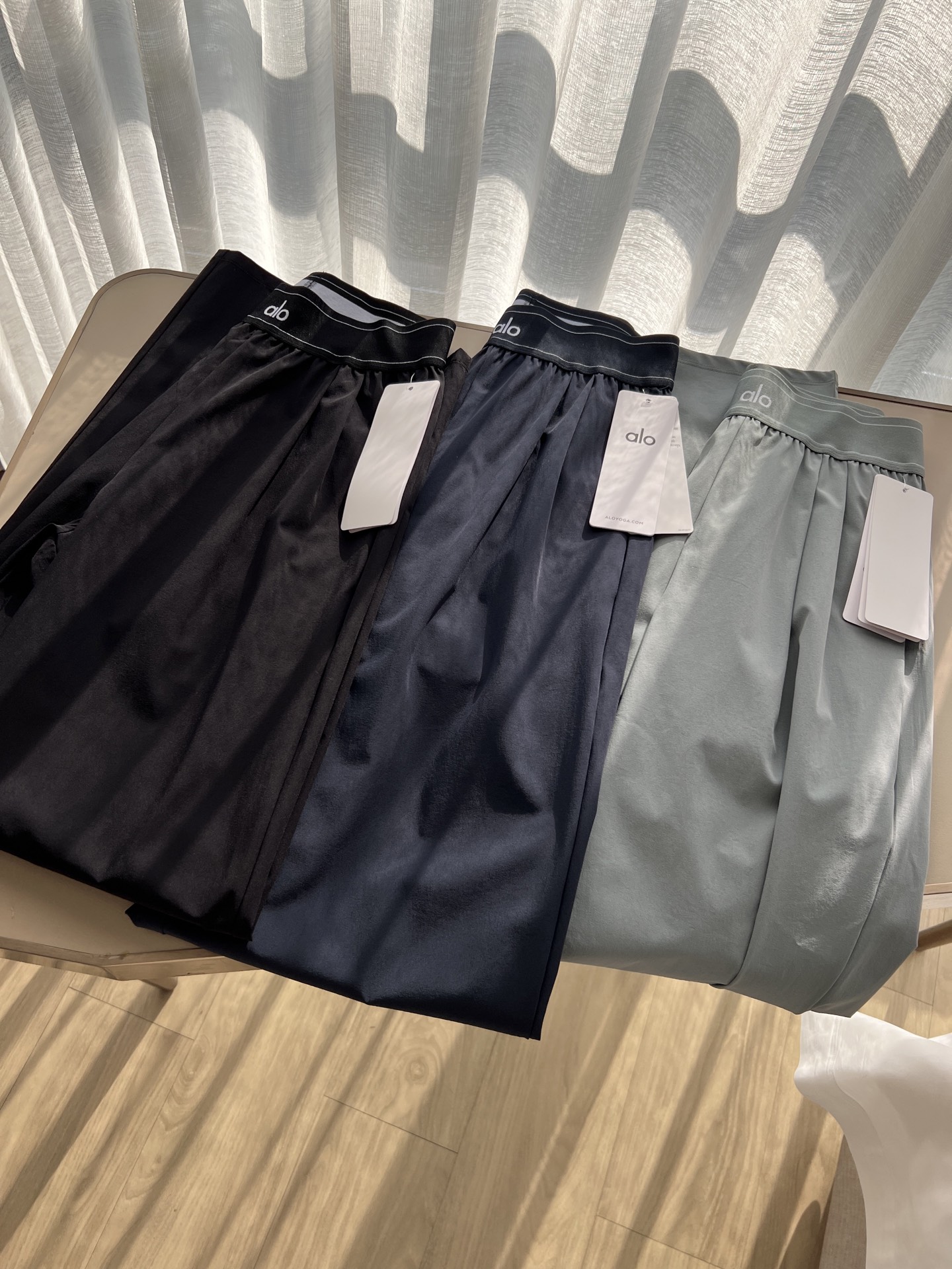 Alo women s bottoms everyday black navy and light sage gray yoga
