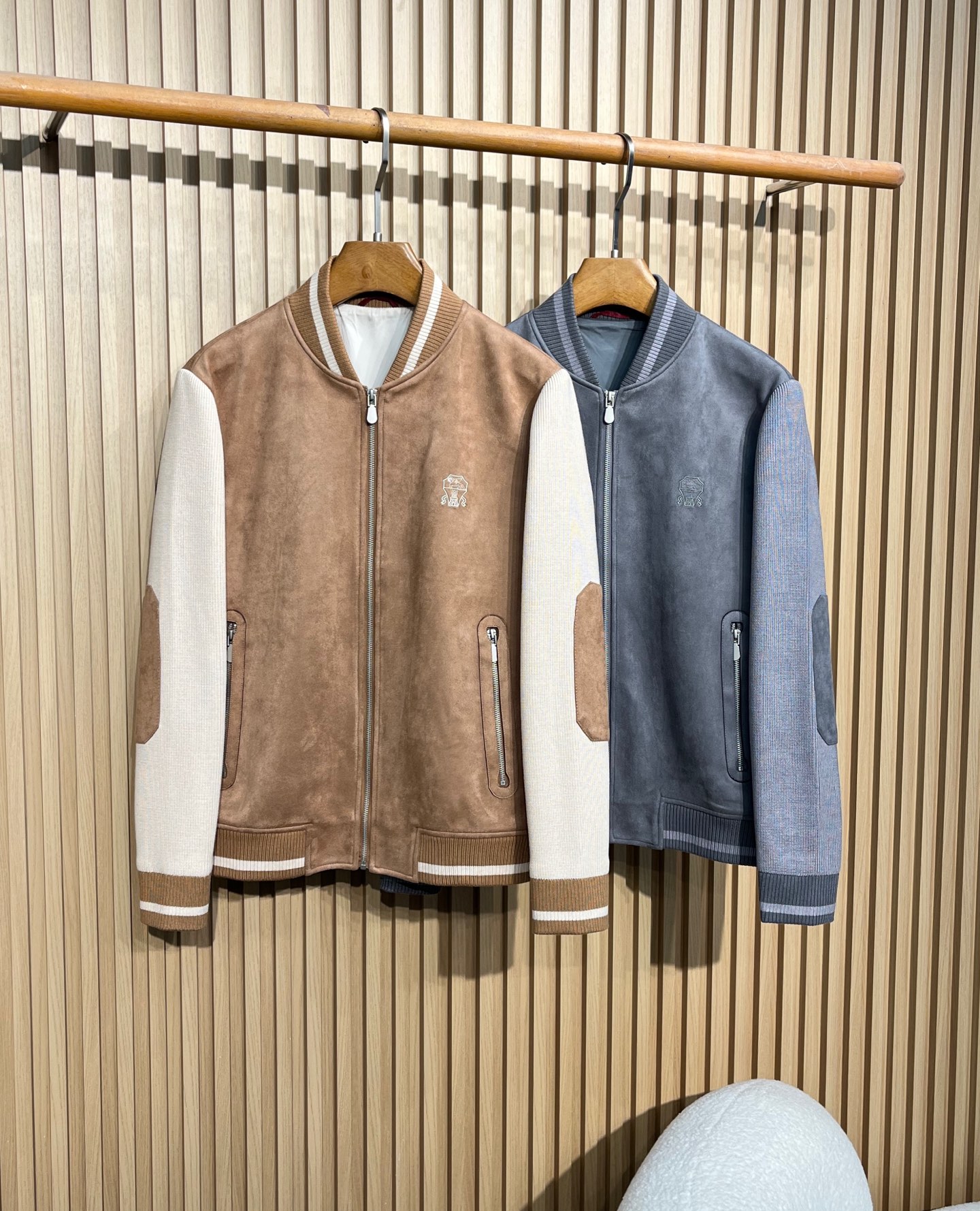 Title: 2025 Brunello Cucinelli Knitted Suit Jacket Overview Summary: Classic baseball style jacket with Italian branding, polyester-ammonium fabric blend, metal zipper, and practical pockets