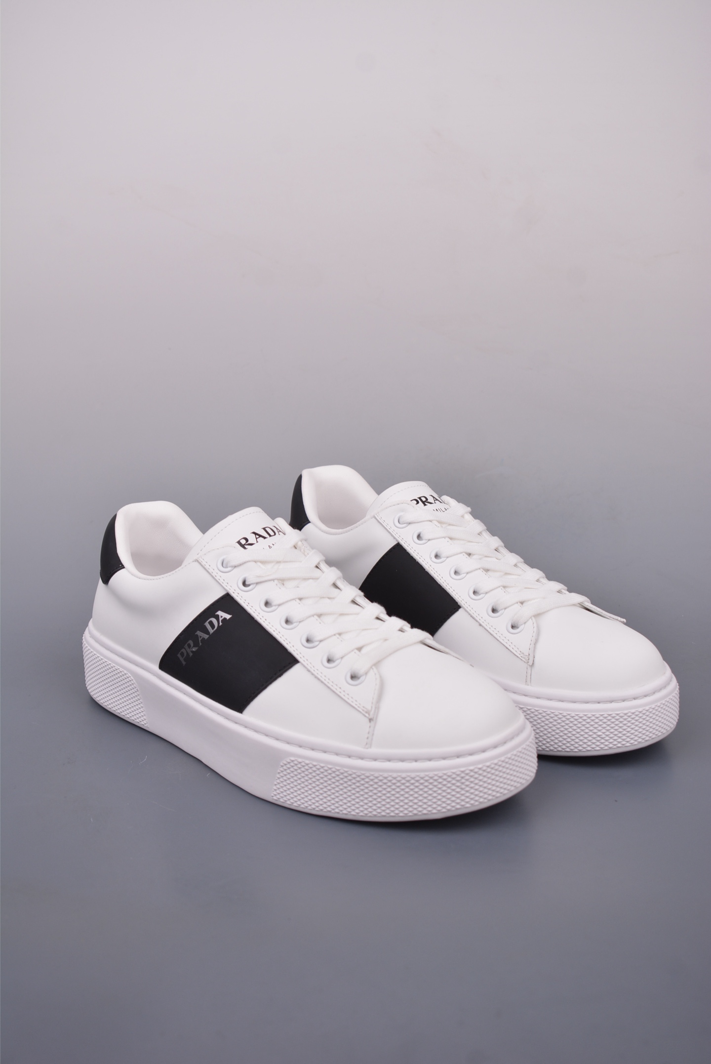 Prada Men's White Leather Low-Top Sneakers with Black Stripe Detail 1 i1746917496925 4315 0 0