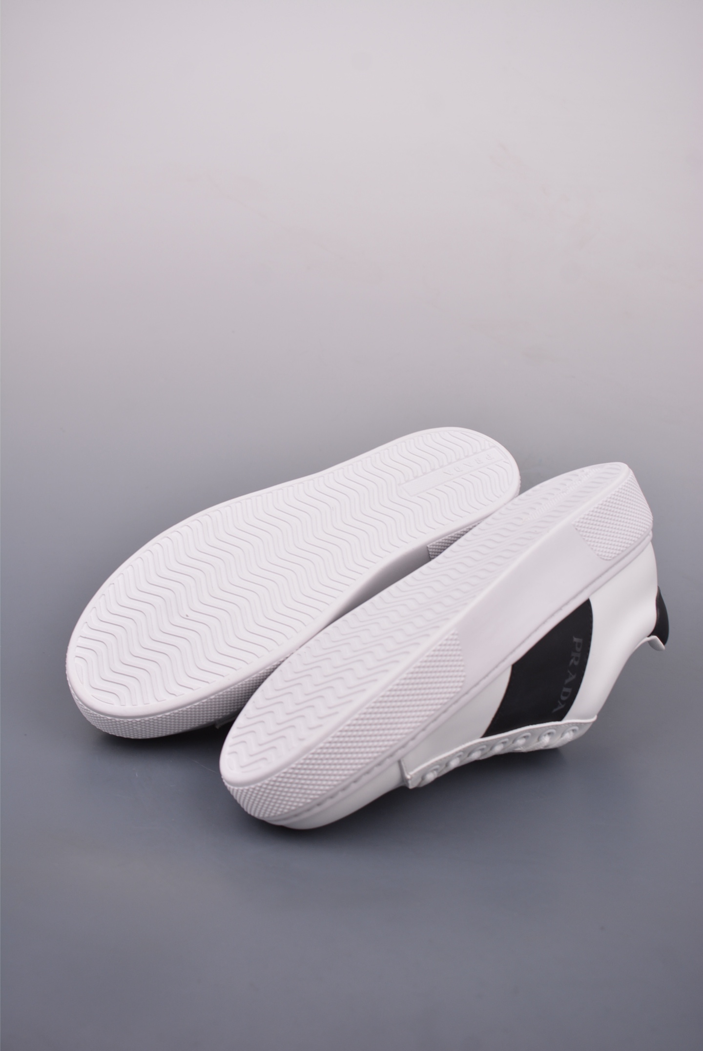 Prada Men's White Leather Low-Top Sneakers with Black Stripe Detail 3 i1746917498255 8312 0 2