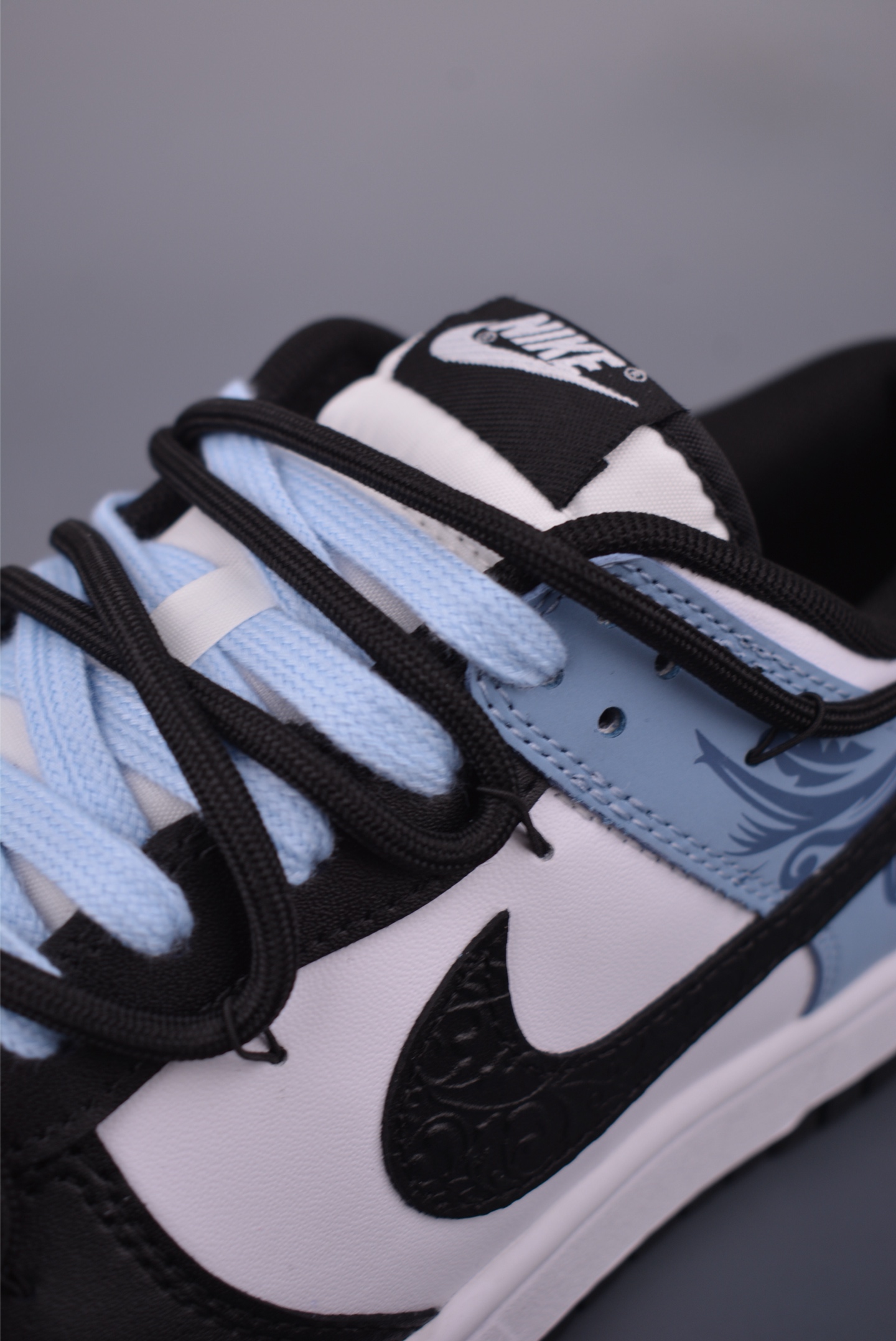 Nike SB Dunk Low Black White Blue with Embossed Design and Drawstring Laces 8 i1751149557334 4485 0 6