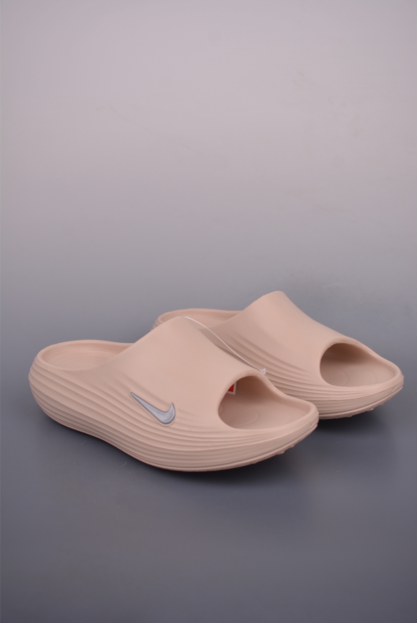 Nike ReactX Rejuven8 Slides: Summer Ready Comfort and Style for Everyday Wear 1 i1753654010932 2080 0 0