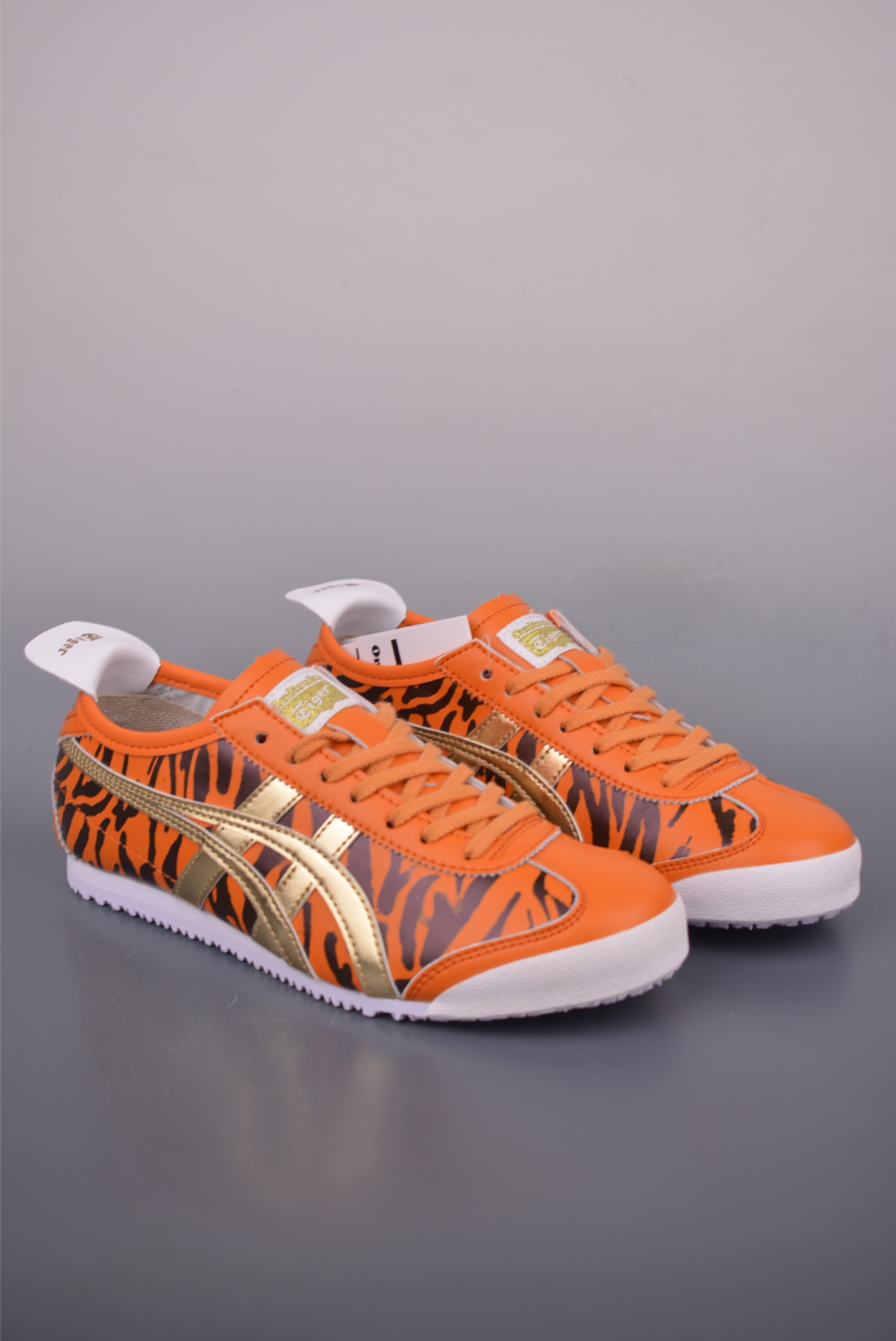 Onitsuka Tiger Mexico 66 Slip-On Sneakers - Orange Tiger Print, Gold Accents 1 i1755294920821 8626 0 0