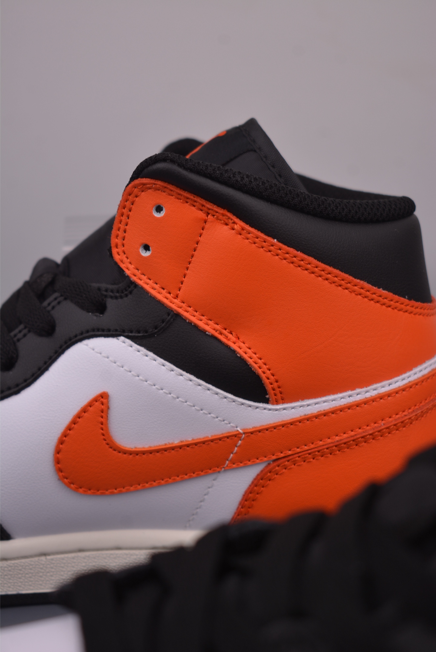 Air Jordan 1 Mid Black, White, and Orange - Fashionable Sneaker 9 i1759019976675 4735 0 8