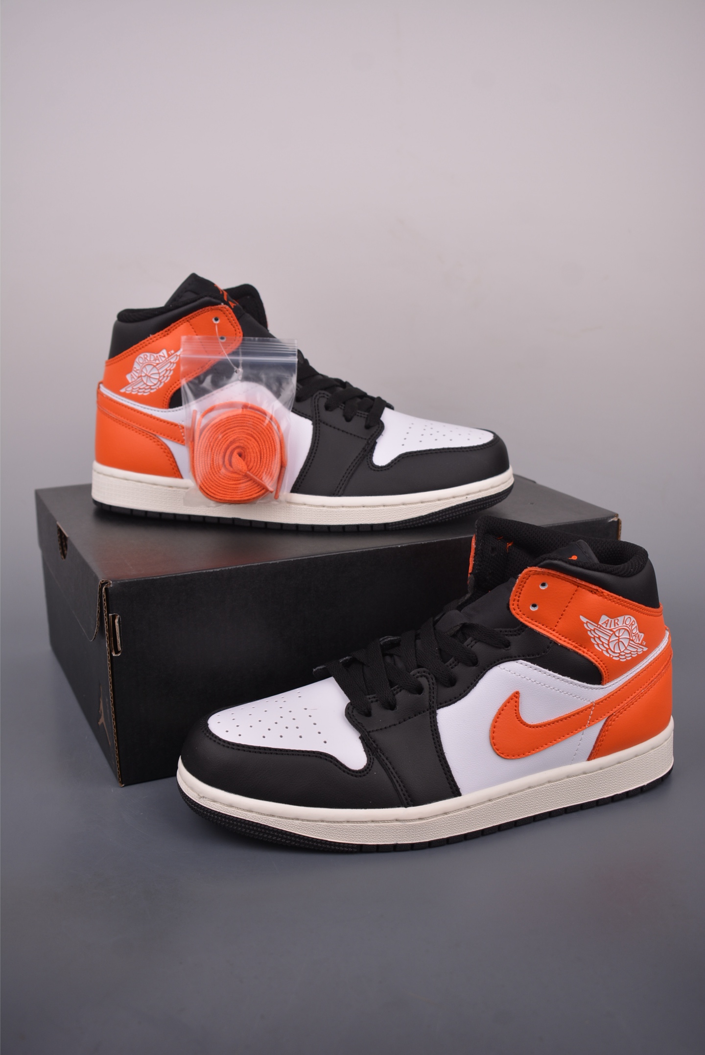 Air Jordan 1 Mid Black, White, and Orange - Fashionable Sneaker 6 i1759019976678 5843 0 4