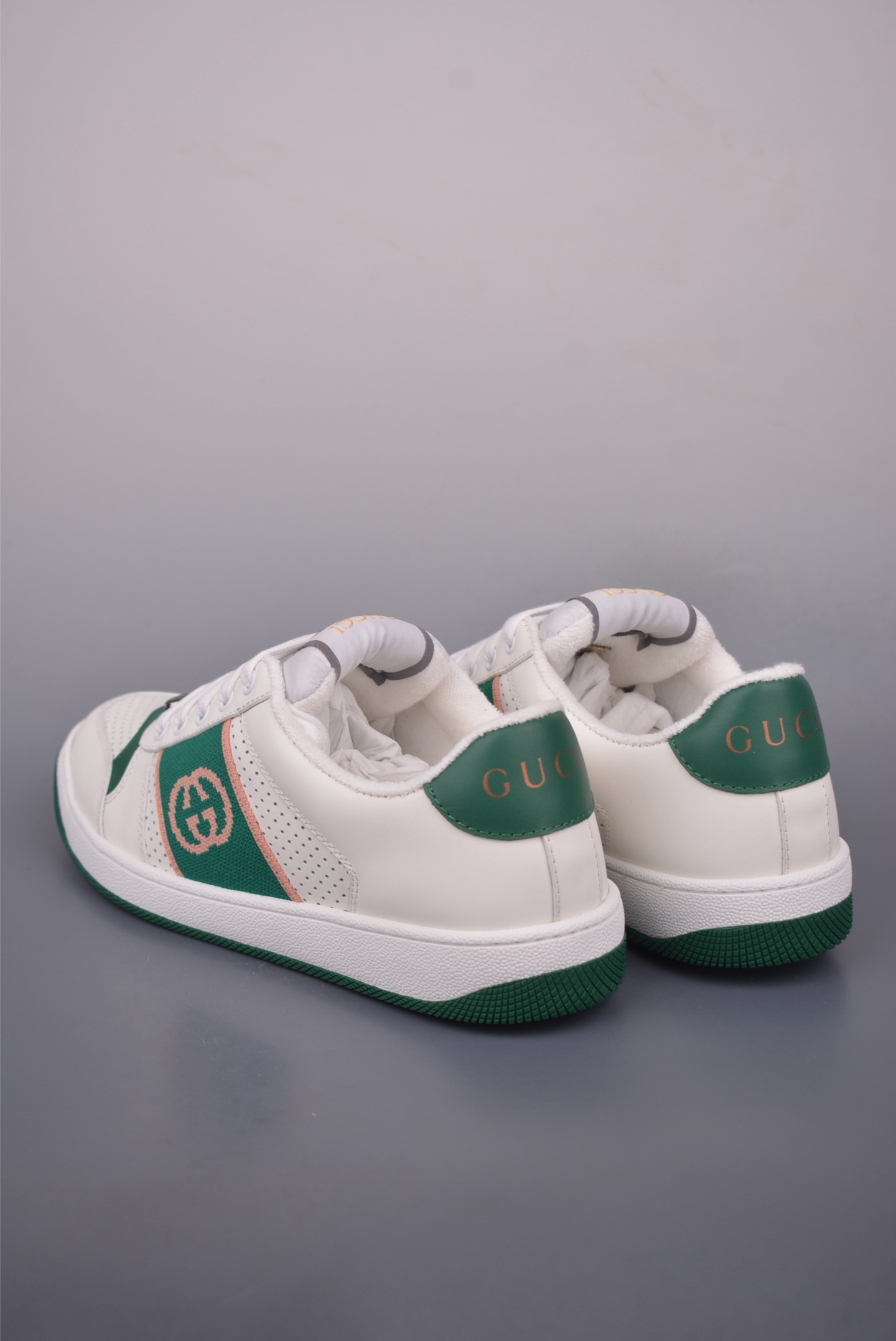 Gucci Screener Leather Sneaker with Green and Orange Web and Enamel Detail 2 i1759283232700 6601 0 1