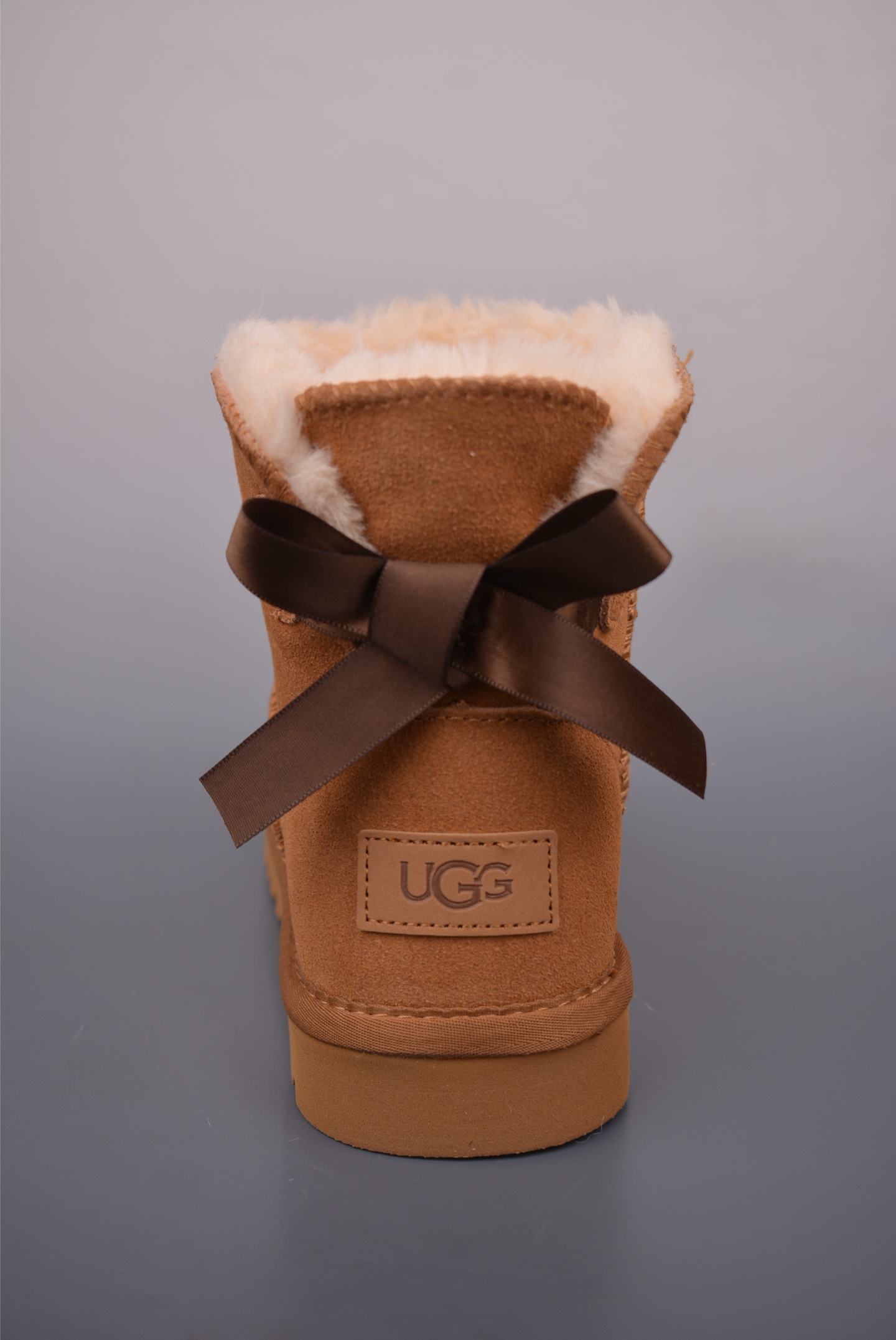 180 UGG WOMEN'S单丝带蝴蝶结 秋冬羊皮毛一体雪地靴 1016501