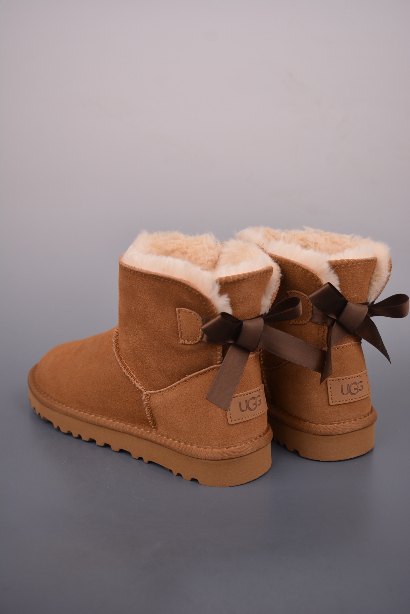 180 UGG WOMEN'S单丝带蝴蝶结 秋冬羊皮毛一体雪地靴 1016501