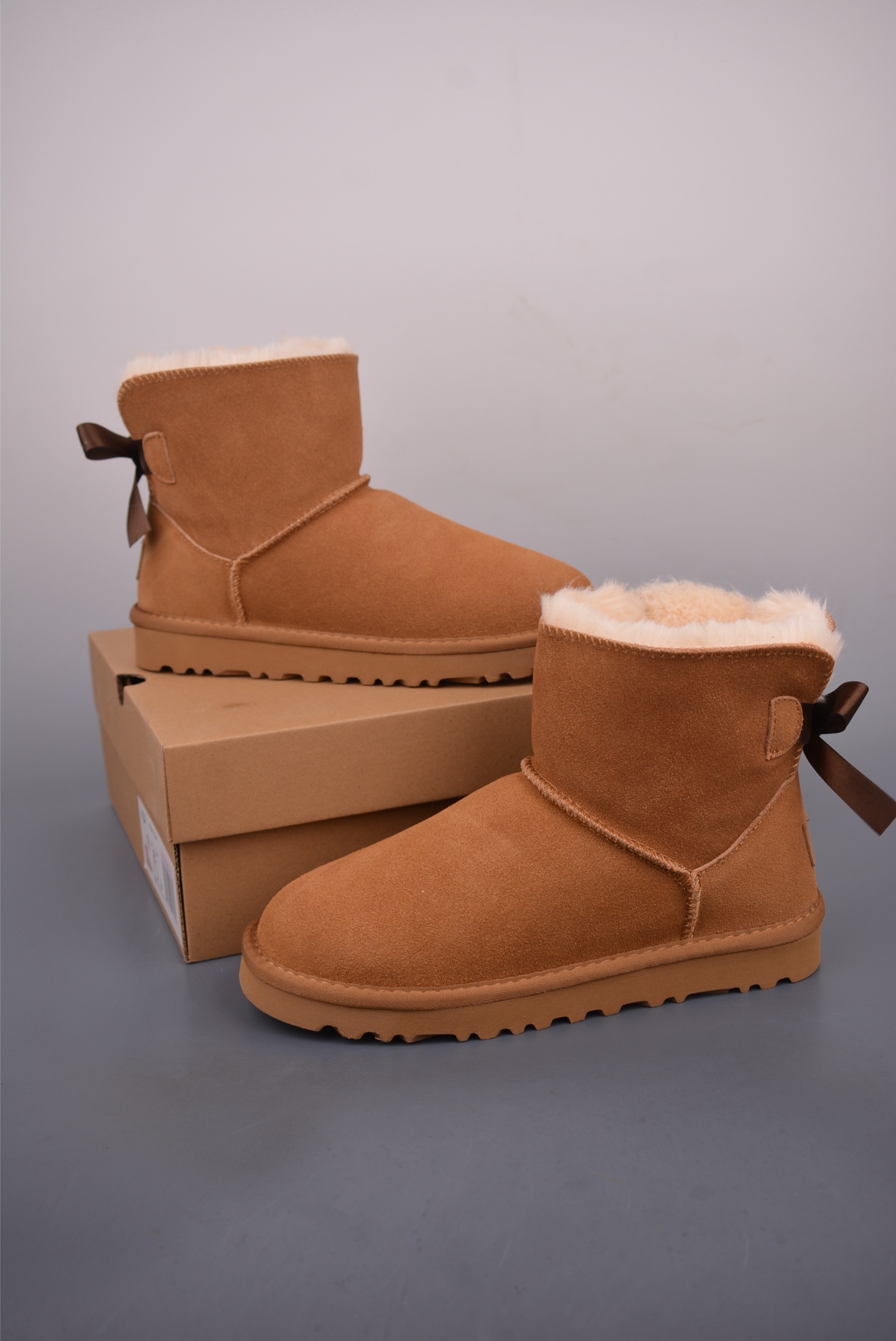 180 UGG WOMEN'S单丝带蝴蝶结 秋冬羊皮毛一体雪地靴 1016501