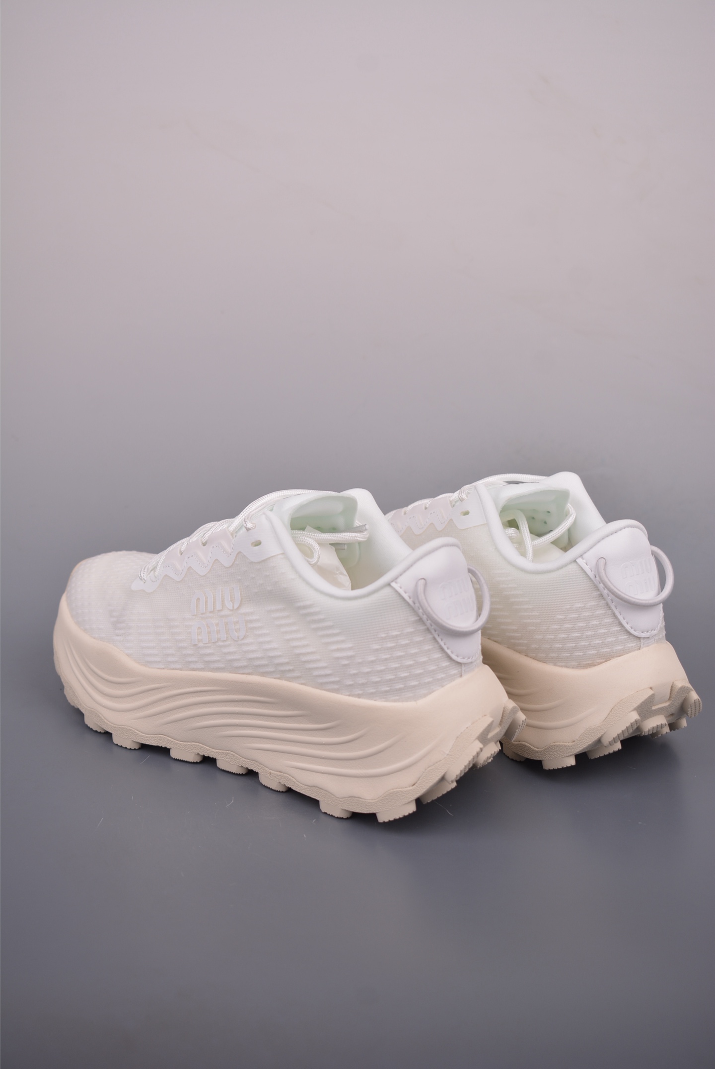 Miu Miu Women's White Mesh Chunky Sole Sneakers Comfortable and Stylish 3 i1761084858845 193 0 1