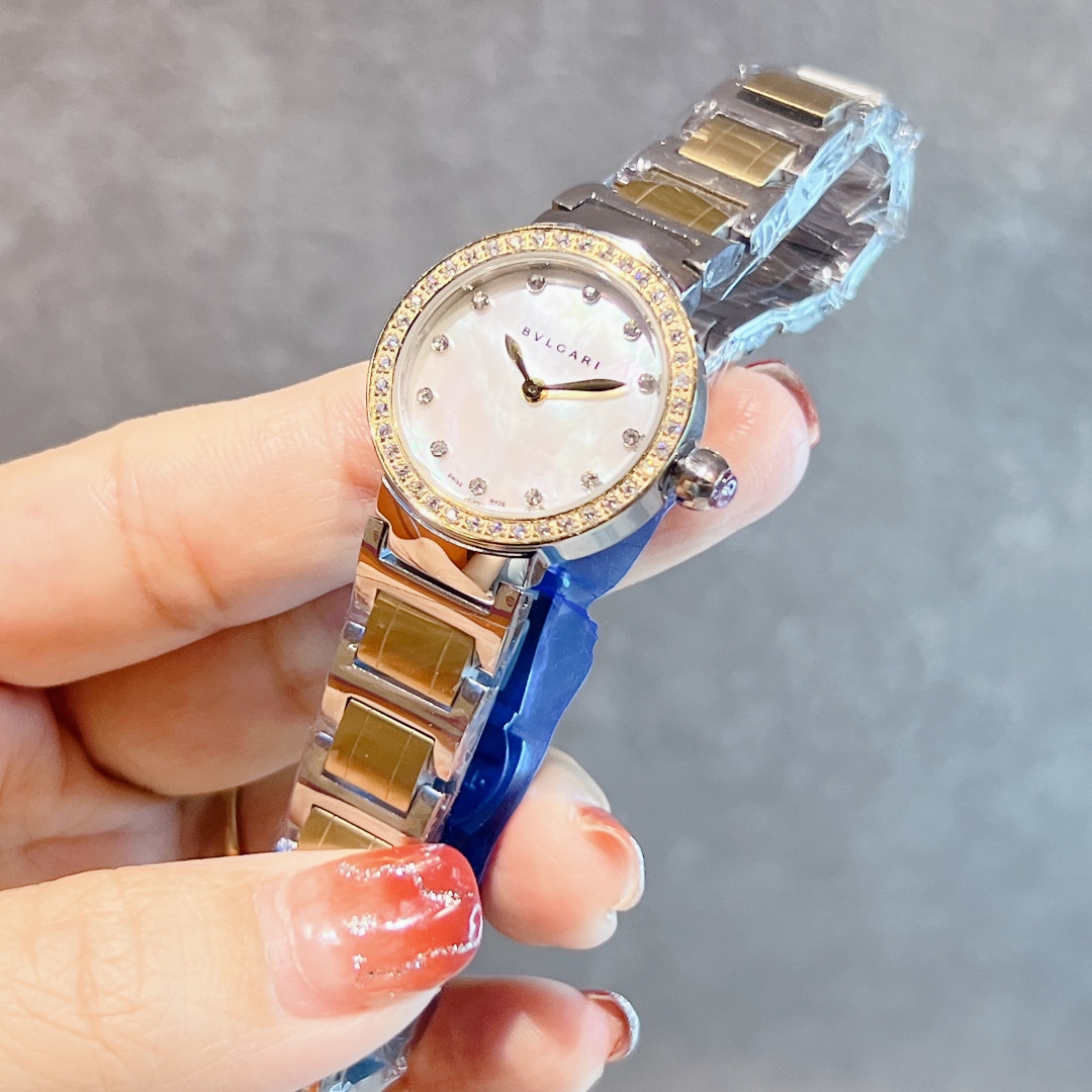 Bvlgari Bvlgari Bvlgari Mini silver case, diamond bezel, burgundy dial, silver bracelet 26mm Women's Quartz