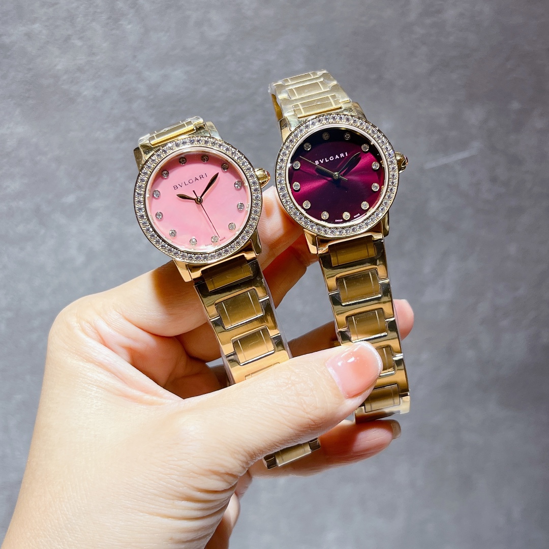Bvlgari Bvlgari Bvlgari Rose gold-tone case and bracelet, diamond bezel, pink or burgundy dial 33mm Women's Quartz