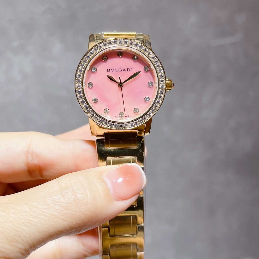 Bvlgari Bvlgari Bvlgari Rose gold-tone case and bracelet, diamond bezel, pink or burgundy dial 33mm Women's Quartz