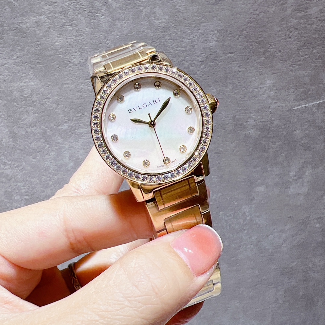 Bvlgari Bvlgari Bvlgari gold case and bracelet, diamond bezel, blue dial 33mm Women's Quartz