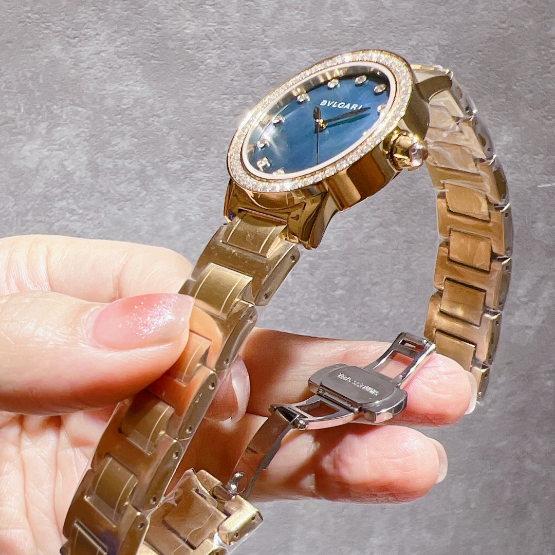 Bvlgari BVLGARI BVLGARI yellow gold case and bracelet, diamond bezel, blue mother-of-pearl dial 33mm Women's Quartz