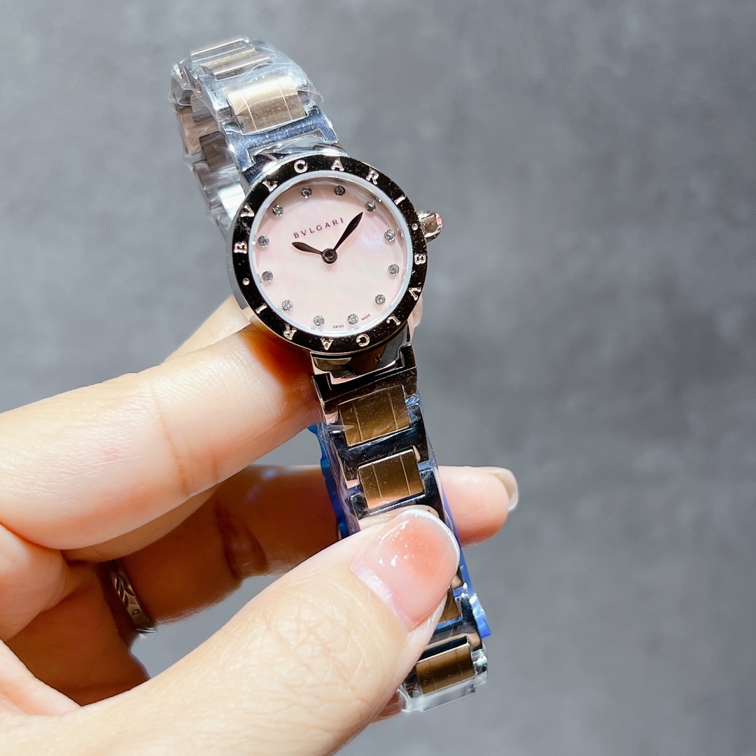Bvlgari Bvlgari Bvlgari Mini stainless steel case and bracelet, black bezel, pink mother-of-pearl dial 26mm Women's Quartz