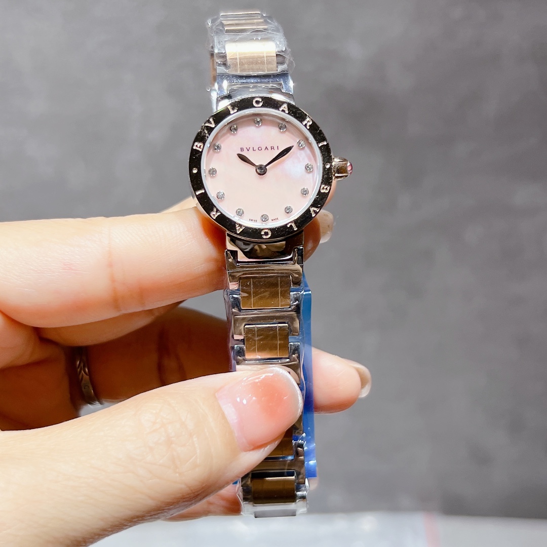 Bvlgari Bvlgari Bvlgari Mini stainless steel case and bracelet, black bezel, pink mother-of-pearl dial 26mm Women's Quartz