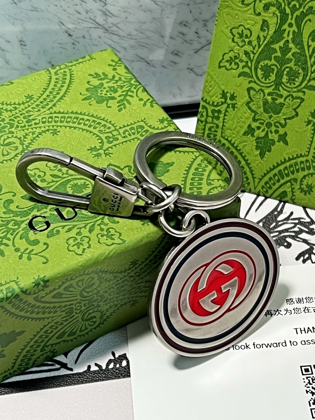 “New Gucci Gucchiguz Key Rings: Stylish Car Key Accessories in Two Colors” - 图片 2