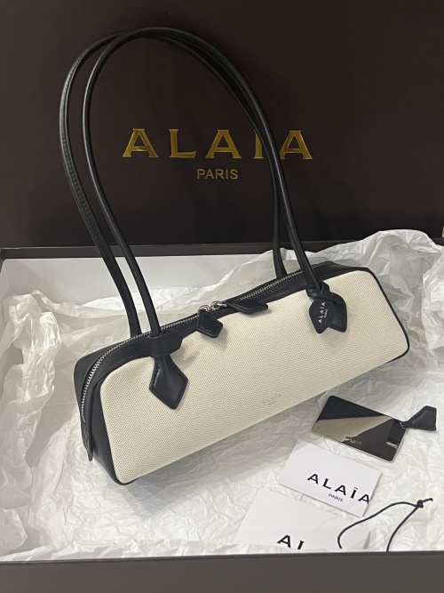 Alaia Canvas & Leather Dachshund Baguette Bag, Ivory & Black 1 Alaia Canvas & Leather Dachshund Baguette Bag, Ivory & Black