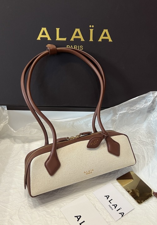 Alaia Small Sausage Dog Bag Canvas and Leather Shoulder Baguette 1 Alaia Small Sausage Dog Bag Canvas and Leather Shoulder Baguette