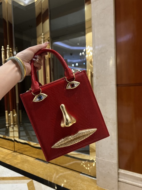 Schiaparelli Surreal Face Red Top Handle Bag - Avant-Garde Fashion Statement 1 Schiaparelli Surreal Face Red Top Handle Bag - Avant-Garde Fashion Statement