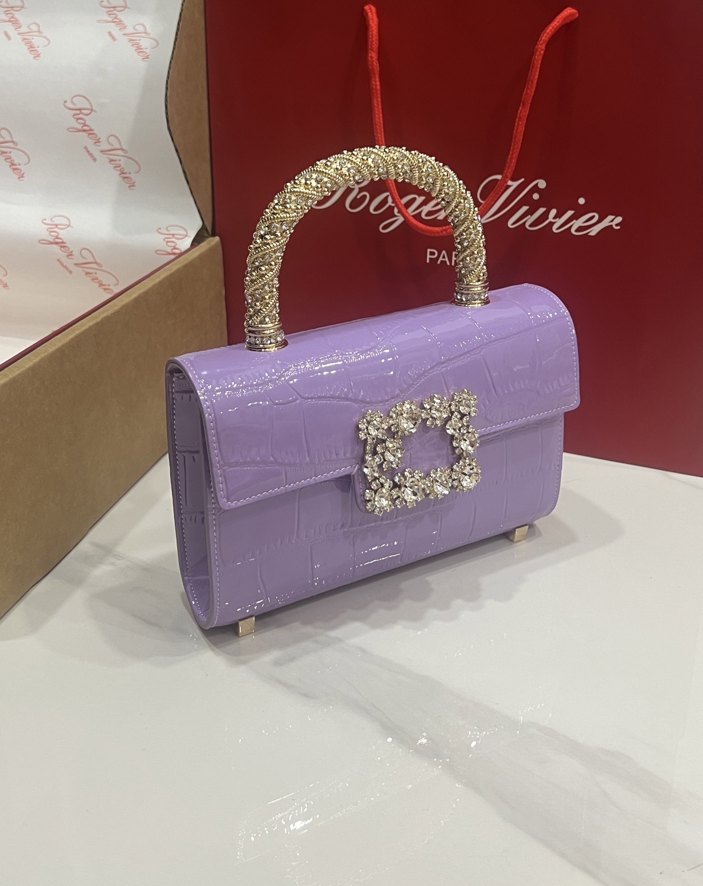 “Roger Vividr Crystal Handbag: Cow Skin Tattoo Design with Water Drills and Star Embossing” - 图片 2