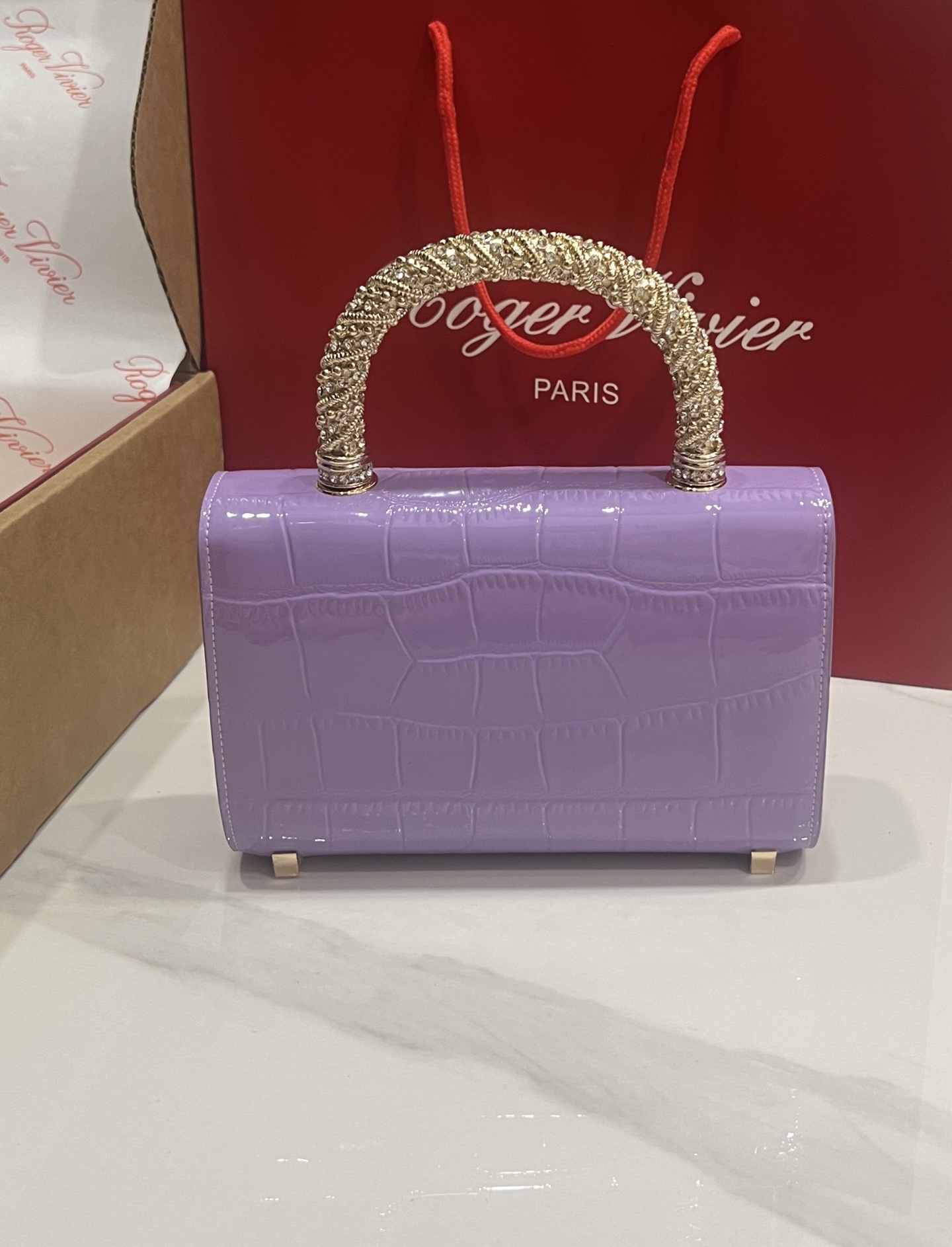 “Roger Vividr Crystal Handbag: Cow Skin Tattoo Design with Water Drills and Star Embossing” - 图片 6