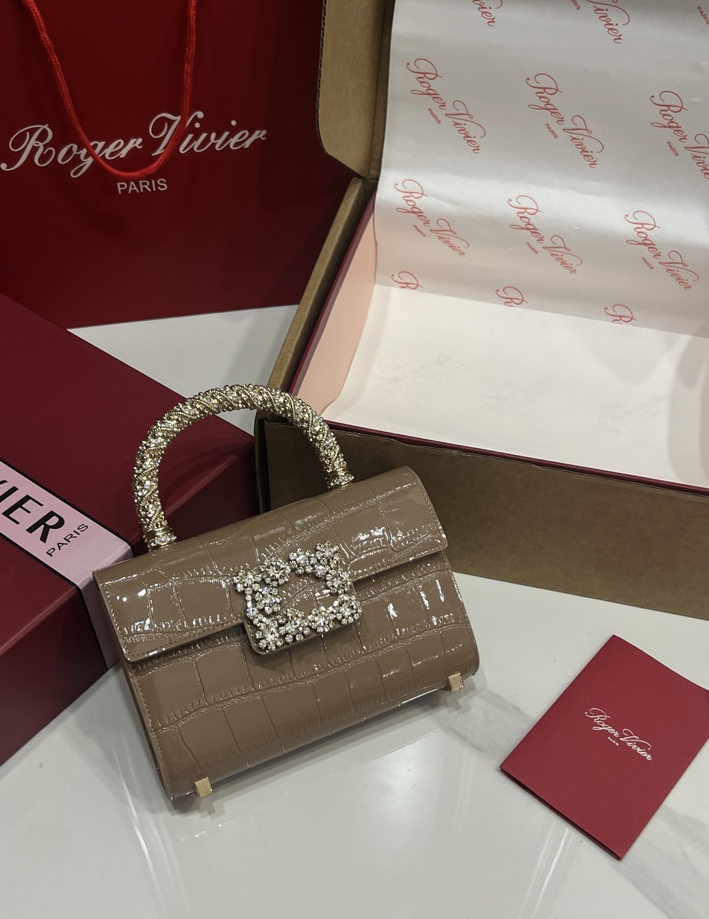 “Roger Vividr Crystal Handbag: Cow Skin with Water Drills, Star Embossing, Acoustics”