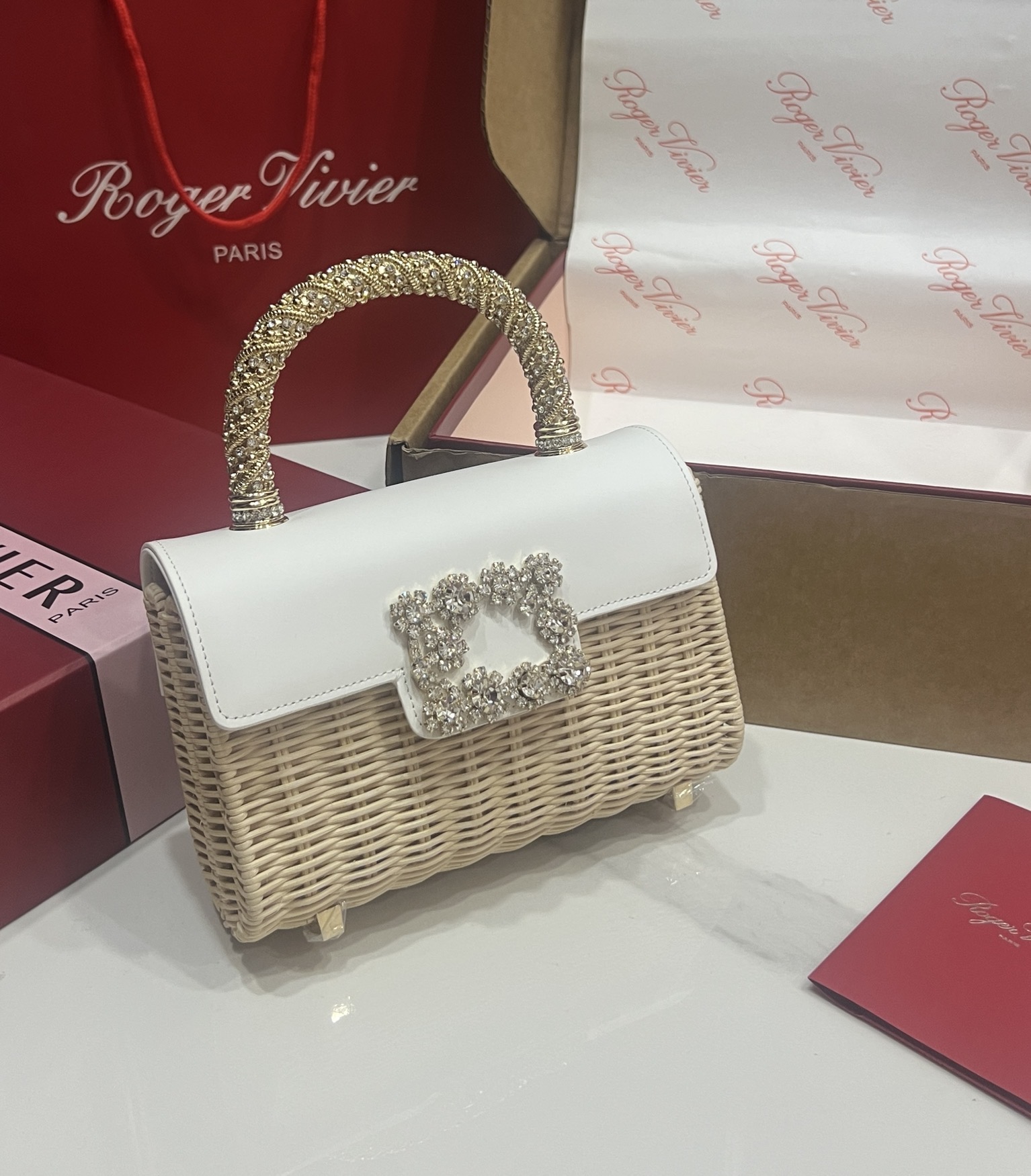 “Roger Vividr Crystal Handbag: Holiday Chic with Cow Skin and Water Drills”